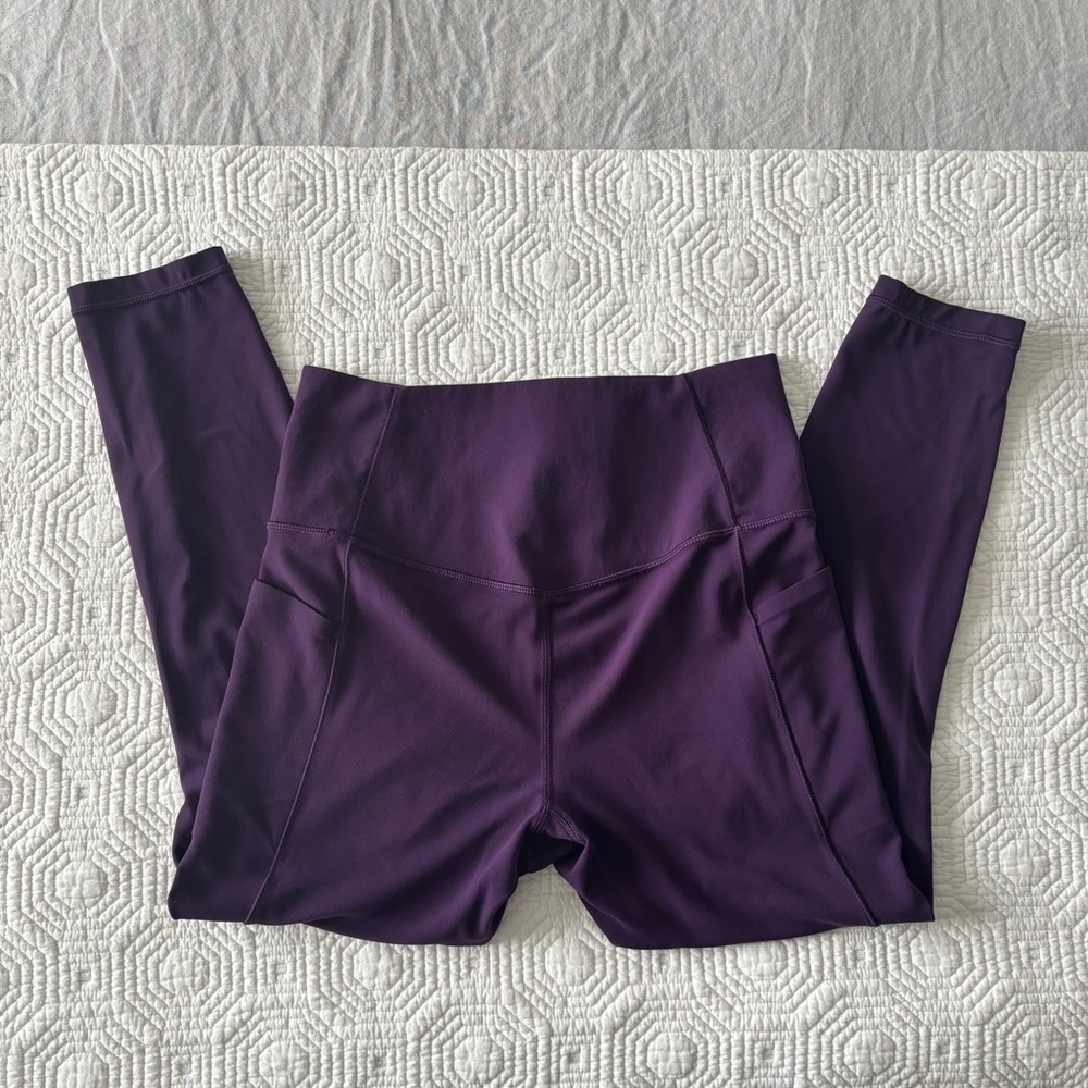 Athleta Salutation Stash High Riss 7/8 Legging